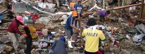 Around 200 local residents of Tacloban have been hired to help in the clean-up efforts and distribution of relief goods in Yolanda-stricken Tacloban City