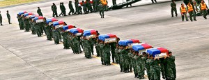 The flag-draped coffins bearing the bodies of 42 of the 44 policemen slained in Mamasapano, Maguindanao in the Philippines