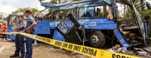 TANAY BUS CRASH. Police, Army and Meralco personnel survey the wreckage of a tourist bus which crashed on the highway to Daranak Falls in Sitio Bayukan, Brgy. Sampaloc, Tanay, Rizal.  Photo credits: MB